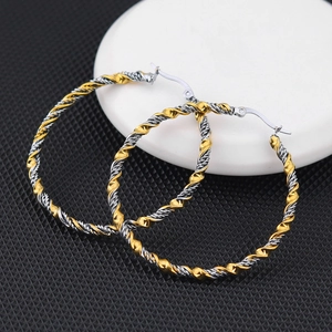 Boucles d'oreilles créoles torsadées bicolores en acier inoxydable doré et argent