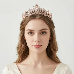 Detail of rose gold baroque crown with heart hollows and champagne rhinestones