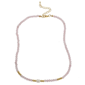 Detailed close-up of pink agate beaded necklace with a central freshwater pearl and gold clasp