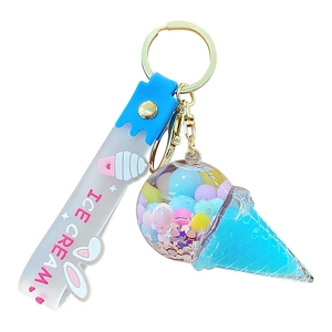 Creative ice cream keychain with colorful beads and star glitter in a clear blue sphere
