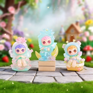 Three cute cartoon flower-themed resin blind box figurines in a fairy tale garden