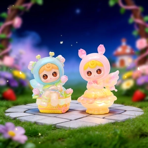 Detailed macro view of two cute flower fairy blind box figurines in a dreamy garden