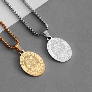 Saint Michael relief pendant necklace in gold and silver stainless steel finish