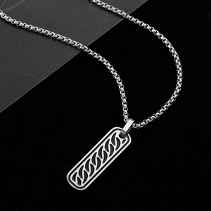 Men's silver stainless steel rectangular pendant necklace with black spiral patterns