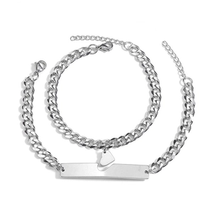 Polished stainless steel couple bracelets with heart cutout and interlocking charms set