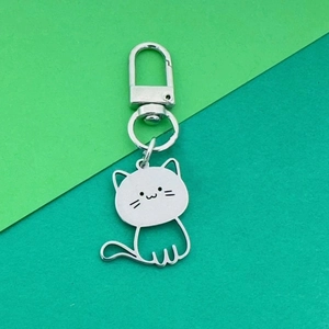 Porte-clés Chat de Dessin Animé en Acier au Titane pour Femmes Hommes Pendentif Animal Creux Minimaliste Bijoux Cadeau