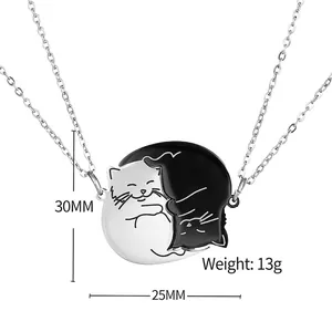 Matching black and white cat couple necklaces in stainless steel for best friends