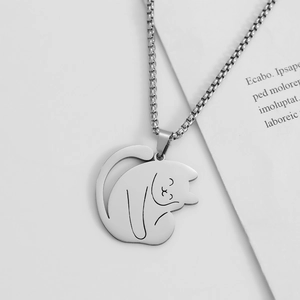 Minimalist stainless steel necklace featuring a cute sleeping cat pendant with black outlines