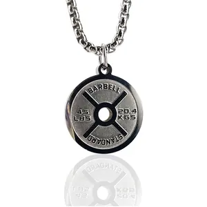 Macro detail of silver stainless steel barbell pendant with 45 LBS engraving