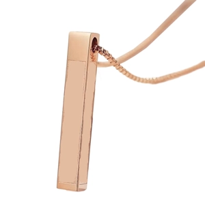 Detailed macro view of the rose gold rectangular pillar pendant with a polished finish