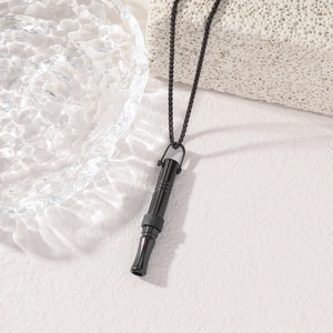 Minimalist black stainless steel mindfulness whistle necklace for stress relief and breathing