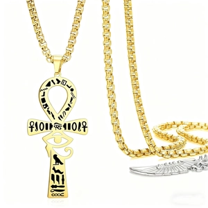 Detail of gold Ankh cross pendant with black Egyptian hieroglyphs on a box chain