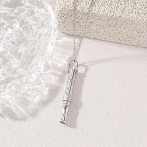 Mindfulness breathing whistle necklace in polished silver stainless steel for stress relief