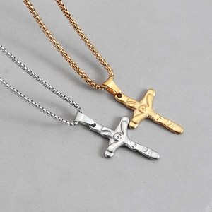 Gothic style cross necklaces in gold and silver finish with skull relief detailing