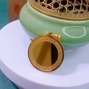 Golden stainless steel Buddhist pendant necklace with engraved scriptures and mirror finish