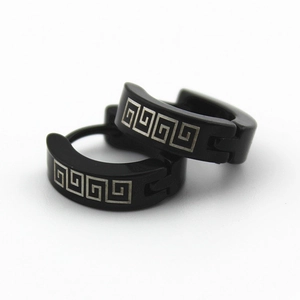Macro view of 4mm black stainless steel hoop earrings with silver Greek key pattern