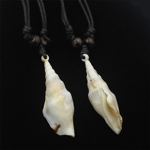 Acrylic conch shell pendant necklace with natural ocean textures on a black woven cord
