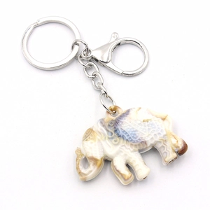 Elephant keychain with acrylic marble pattern pendant and metal lobster clasp on white background