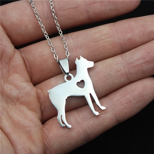Stainless steel Cane Corso silhouette pendant necklace with a cutout heart on a silver chain