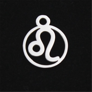 Macro shot of silver Leo zodiac charm with hollow design for DIY jewelry making