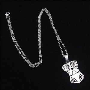 Macro detail of silver stainless steel hollow pug dog pendant and high quality link chain