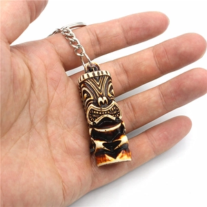 Tribal Tiki statue keychain with hand-carved bone effect and durable metal keyring