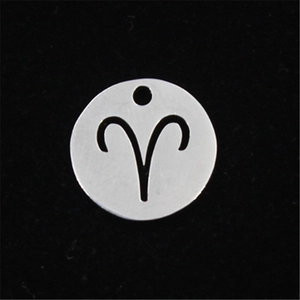 Aries zodiac charm in stainless steel with hollow design on black velvet background