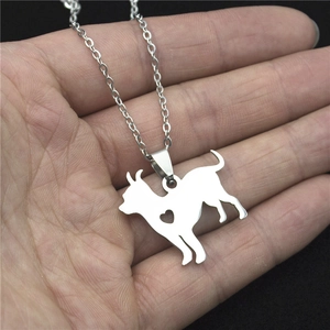 Laser cut stainless steel dog necklace with a hollow heart chihuahua pendant on a chain