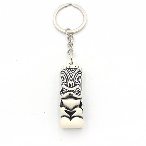 Polynesian Tiki resin keychain with tribal totem carvings and silver metal ring