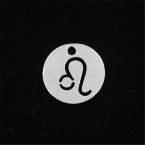 Detailed macro shot of silver Leo zodiac symbol stainless steel circular pendant charm