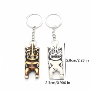Polynesian Tiki statue keychain set in wood texture and ivory resin with dimensions