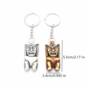 Detailed view of Tiki resin keychains in bone and wood finish with dimensions marked