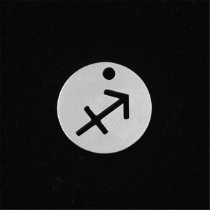 Macro view of Sagittarius stainless steel pendant with cutout zodiac symbol design