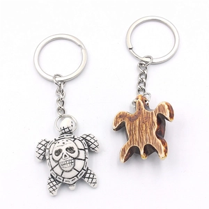 Halloween turtle keychain set with skull pattern and wooden texture resin pendants