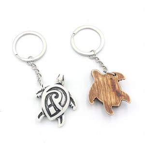 Tribal style silver turtle and wood grain sea turtle keychain set for bags