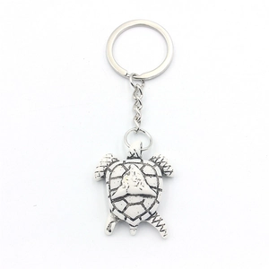 Creative turtle keychain with white cracked resin turtle pendant and silver metal ring