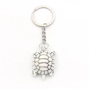Creative white resin turtle keychain with black marble pattern and silver stainless steel ring