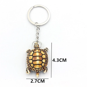 Realistic resin sea turtle keychain with detailed brown shell and silver metal ring