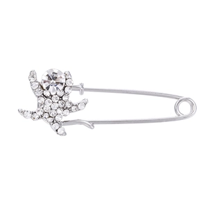 Elegante spilla a forma di polpo argentato con cristalli bianchi e grande diamante