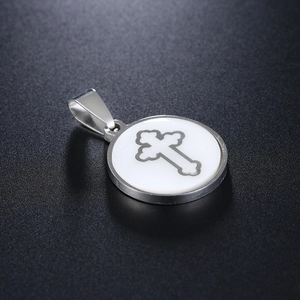 Polished stainless steel round pendant featuring shell inlay and cross design for women