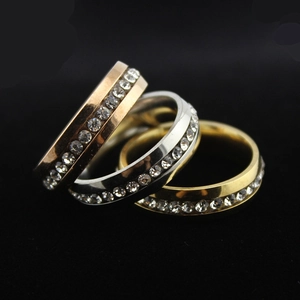 Three-piece set of polished stainless steel rings with single row crystals in mixed tones