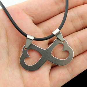 Stainless steel infinity heart necklace with matte finish on black cord pendant