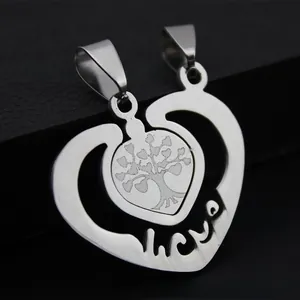 Detail view of stainless steel heart pendant with LOVE cutout and Tree of Life design
