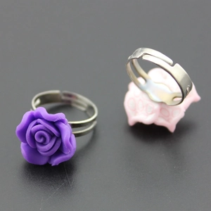 Adjustable floral resin flower rings in purple and pink for women and girls