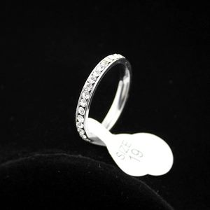 Silver stainless steel eternity ring with cubic zirconia stones and size 19 tag