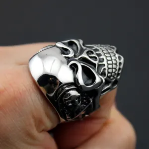 Close-up of gothic punk men's skull ring in vintage silver finish stainless steel