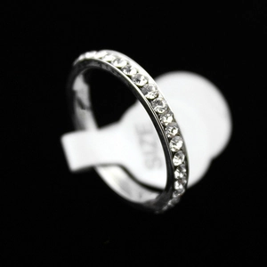 Elegant silver stainless steel eternity ring with shimmering pavé set cubic zirconia