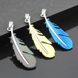 Detailed view of handmade feather charms in silver, gold, and blue metallic finishes