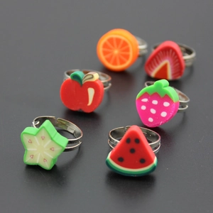 6-piece set of adjustable fruit-themed rings for kids with colorful clay shapes