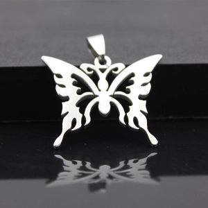 Polished stainless steel butterfly pendant with hollow design on black reflection surface